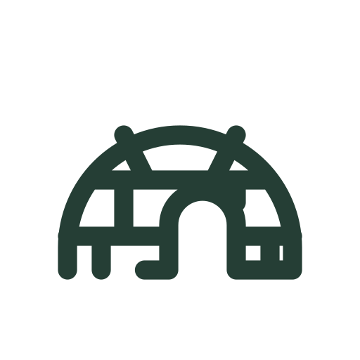 A domed igloo made of snow blocks draws into view with a small arched entrance.