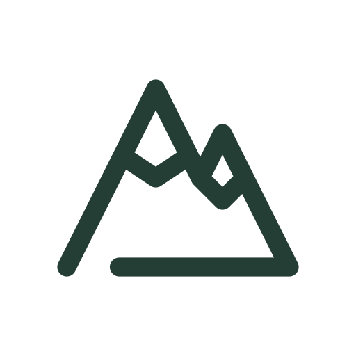 Two snowy mountain peaks draw into view for winter trips, alpine scenery, and seasonal outdoor guides.